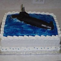 Submarine Made this for a friend in the Navy. Sub is molded out of rice krispy treats and covered with fondant.