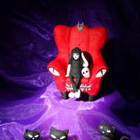 Emily Strange Made these cake toppers for an Emily Strange cake, Made the chair with rice crispy treats.