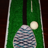 Lacrosse Stick Double chocolate cake iced with buttercream. Full size lacrosse stick & ball molded from rice crispie treats. Very large cake!