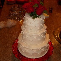 Sister's Wedding This was the First Wedding cake I did, with exception to the practice. She didn't want fondont. And the cake melted because my mom&#...