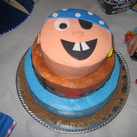 Kids Pirate Fondant for the facial feautures and buttercream used to cover and decorate the cake.