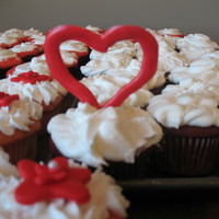 3-D Heart Cupcake I made 200 cupcakes for a wedding. They wanted 4 different types of cake and then I decorated them 4 different ways. They displayed them on...