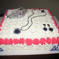 Princess Cake W/ Jewelry I have boys so I welcomed my neighbors request to do her daughters birthday cake. Princess and girly. The jewelry is a cheap set I picked...