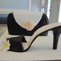Shoe & Purse Cake Gumpaste show with red velvet cake and butter cream frosting inside chocolate fondant