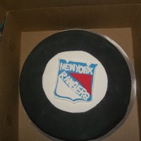 Nyr Hockey Puck Cake This cake was my very first attempt at a cake from scratch! My boyfriend is a huge NYR fan and I surprise him with this cake on his...
