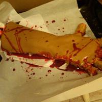 Severed Arm Cake My friend does makeup effects for zombies, etc. so I decided to make this cake for his birthday. Chocolate cake with cheesecake filling and...