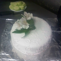 Grandmother's 70Th Birthday Cake My first attempt at piping! My family threw my grandmother a small surprise 70th birthday party and my mother asked me to make my grandma a...