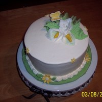 Spring's A Coming. Marble cake with buttercream frosting & fondant decorations.
