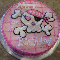Pink Pirate Cake Strawberry cake covered in homemade buttercream icing to match pink Pirate Birthday for a little girl.
