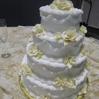 50Th Wedding Anniversary Cake All buttercream, accented with fondant roses that I dusted in gold shimmer dust.