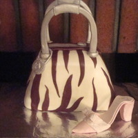 Zebra Purse And Shoe I made this cake for my daughter's 21st birthday. Red Velvet cake is covered with marshmallow fondant and chocolate marshmallow...