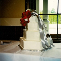 Hexigon Wedding Cake With Bouquet buttercream stacked wedding cake