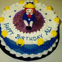 Madeline Birthday Cake buttercream with fondant madeline figure and hats