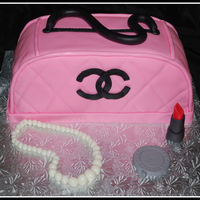 Chanel Purse This is a duplicate of my first purse cake I made. Thanks for looking :)