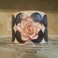 Rose Cake Chocolate cake with black fondant circles & a gumpaste rose