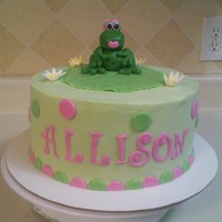 Frog Birthday Cake White cake iced with buttercream. Frog & accents are MMF.