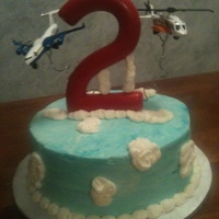 Birthday Take Off Giant chocolate two ontop of a white cake covered in buttercream