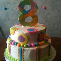 Turning 8 Is Great! vanilla cake with oero filling, covered in buttercream and decorated in fondant