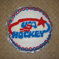 Usa Birthday Cake This was a straight chocolate cake for a friends husband whom is a hockey ref. We wanted something different from the usual Red Wings cake...