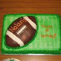 Football Birthday Cake This is a white chocolate velvet cake on the bottom and a confetti football.
