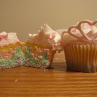 'sydney' Made for a five year old girls princess birthday party. Crowns are made from royal icing and molded on large flower formers. Icing is...