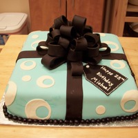 Chic Present Birthday Cake 12" square with loop bow and crescent circles. Rolled little fondant balls to make border. Writing is in royal icing.