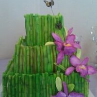 Bamboozeled Hawaiian theme wedding cake. My first gum paste orchid.