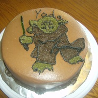 Yoda Cake For this design I used a piping gel transfer method to transfer Yoda from a coloring book. This was my first attempt at a character...