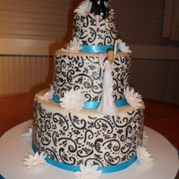 One Less Fish In The Sea! I made this cake for my sister in laws wedding! Just as she ask for, black scroll, white gerber daisies, blue ribbon! And don't forget...