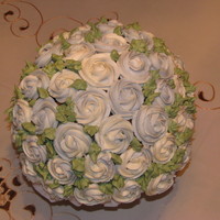 Mini Cupcake Bouquet There were 50 mini cupcakes in this bouquet. The ones around the base started to fall out. I will have to figure out how to reinforce them...