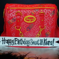 Coogi Purse Made to look like a friend's daughter's Coogi Purse. White cake filled and iced with cheesecake buttercream, covered in MMF. This...
