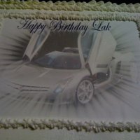 Cadillac With Suicide-Doors The gentleman's nick name was Cadillac or Lac. It only seemed appropriate to put this on his cake. Edible image - strawberry cake with...