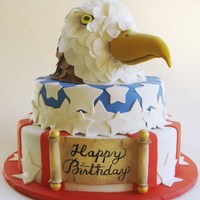 Patriotic Birthday Cake Two tier cake covered in fondant. Eagle head on top was foam covered in fondant,