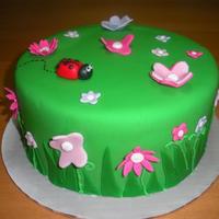 Garden Cake My second time covering a cake in fondant. I had been wanting to make a cute little ladybug and got my inspiration from several cakes on...