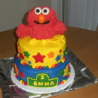 Elmo My first attempt at a "professional looking" cake for my daughter's birthday. I don't quite have smoothing the edges...