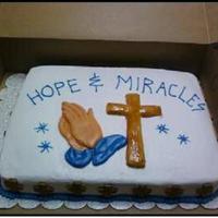 Hope & Miracles MMF cross and hands, pound cake with bavarian cream filling, iced with buttercream
