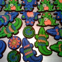 Frog And Gator Cookies Chocolate rolled cookies with royal icing. I made fondant flowers for my birthday cake, but ended up not using them, so here they are as...