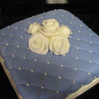 Parents' Anniversary Cake:) Choc. cake, homemade buttercream, MMF, and buttercream dots. These are my FIRST roses and they were so fun to make:) Also coated cake in...