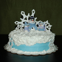 Snow Family This was for my sons teacher for christmas. Devil foods cake with BC