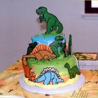 Prehistoric Birthday Cake Everyone loved this cake for my 9 year olds birthday party. It's a 2 tier cake (6" & 9") - bright buttercream frosting...