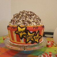 Tub Of Popcorn This was my first attempt at fondant. The topping is a rocky road popcorn mixture made like you would rice krispy treats. Tastes really...