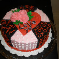 Love Ya I made this in Course 1 of the Wilton Cake Classes. It's decorated entirely with buttercream.