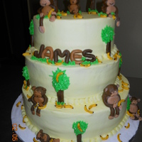 Moneky Cake 3 tier monkey cake for a first birthday at church. Iced with butter cream and fondant decorations