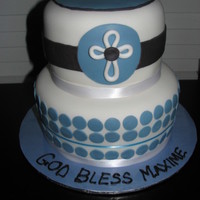 Baptism Cake Two tiered 6" and 8" covered in fondant with fondant decorations. Ribbon is not edible.