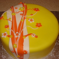 Yellow And Orange Birthday Cake Made for my daughter's birthday. Coconut cake with coconut pudding filling. MMF