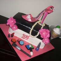 "i'm A A Diva" Entire cake is edible. Shoe made of MMF, fantasy flowers and make up.