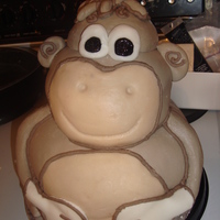 Monkey This is a monkey cake made for a 1 year old bday party. I made a banana smash cake to go along with it.