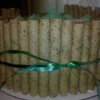 Cookie Cake Chocolate fudge cake with almond buttercream frosting and hazelnut cookies on the side