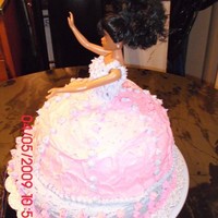 Doll Cake Princess Doll cake....the dress is a butter cake with butter cream frosting the bottom layer is strawberry cake with buttercream frosting