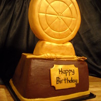 Have Your Trophy And Eat It Too Dartboard trophy cake that I made for coworker's friends birthday. The gold topper is all Rkt. The cake looked so good with just...